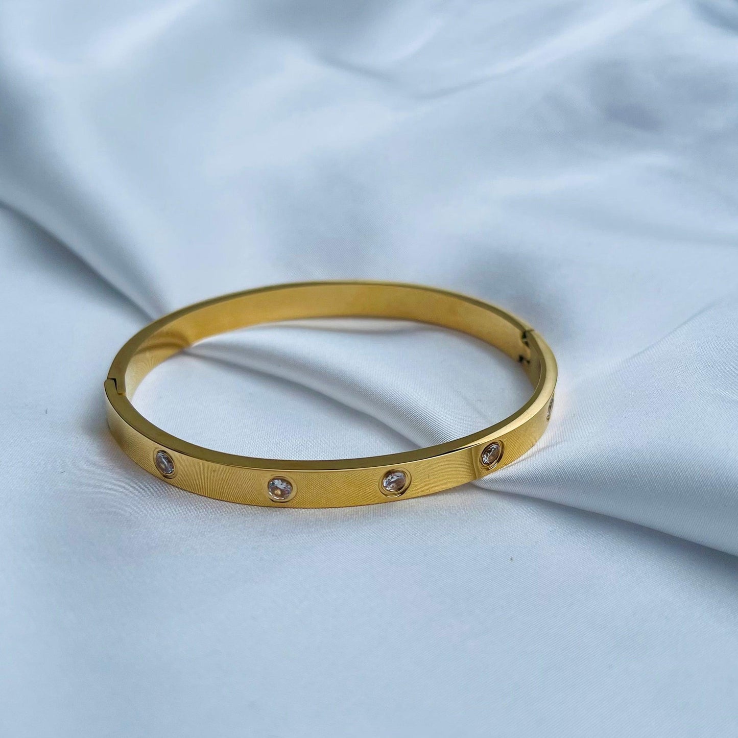 Radiant Elegance: Cubic Zirconia Stones Stainless Steel Bangle - Whisperz