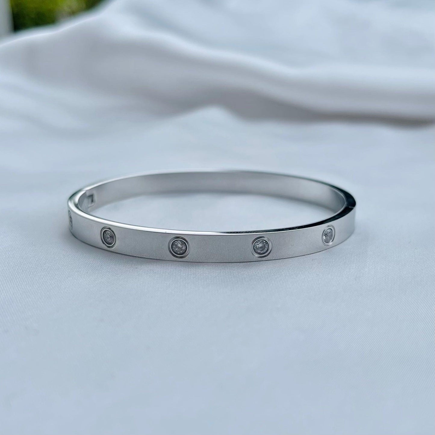 Radiant Elegance: Cubic Zirconia Stones Stainless Steel Bangle - Whisperz
